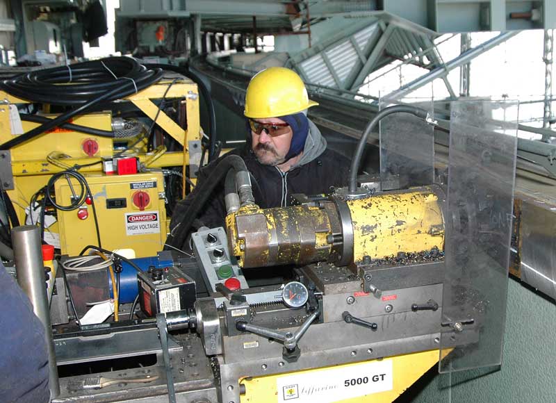 IPM technician performing girder machining