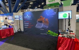 Exact Metrology booth at tradeshow